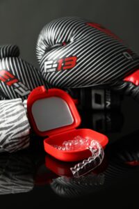 mouth guard and boxing gloves